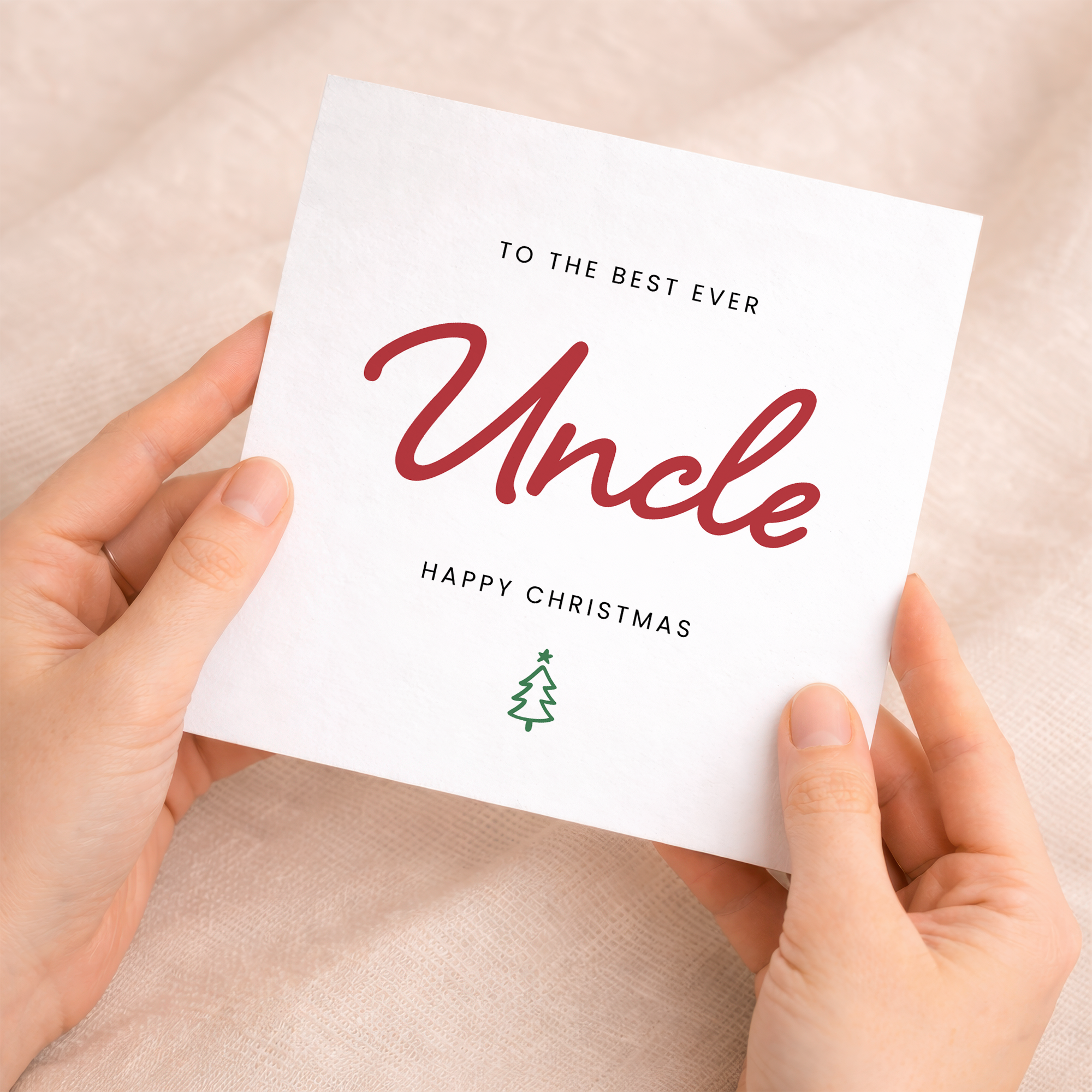 A festive Christmas greeting card for an uncle featuring a simple typographic design with the text Best Uncle Ever on a white background.