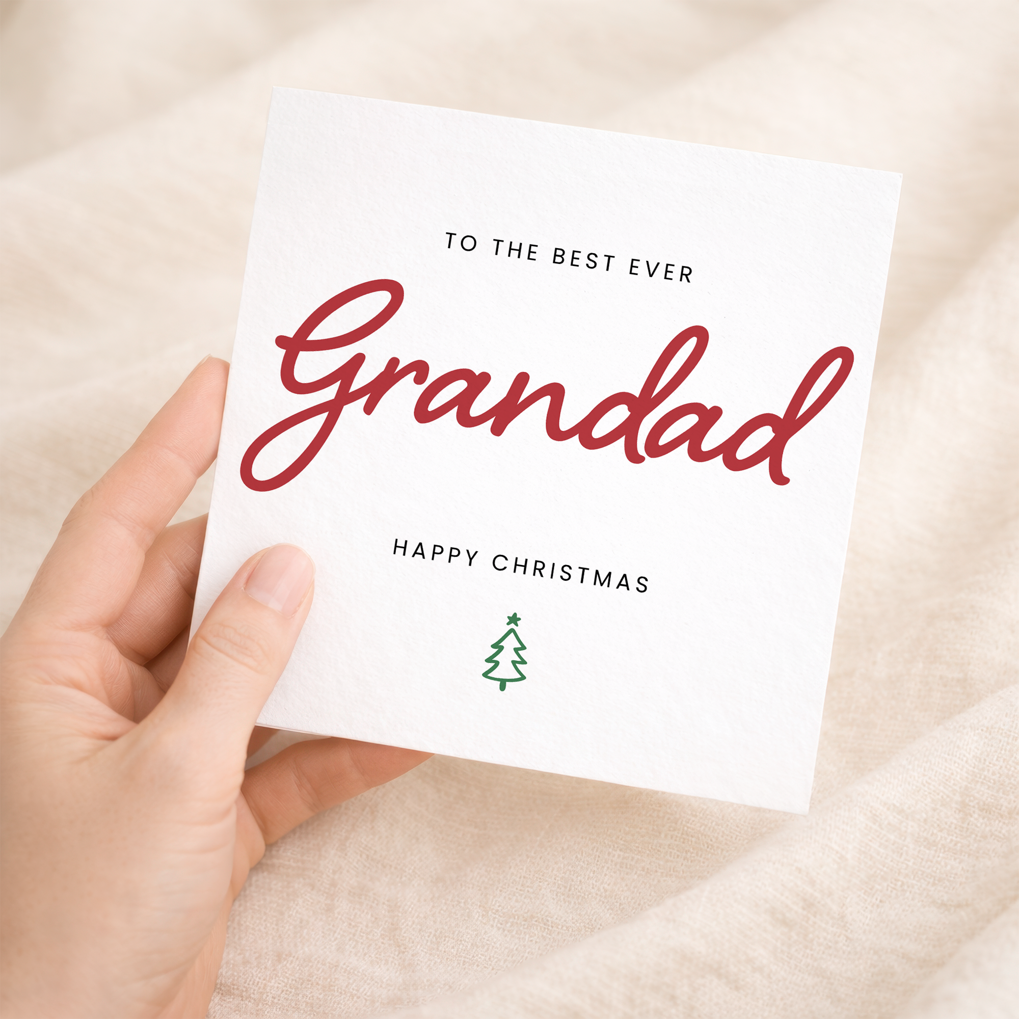 A Christmas greeting card for Grandad featuring a Best Grandad Ever design with a letters and numbers theme on a white background.