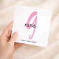A simple 9th wedding anniversary greeting card for him or her featuring a letters and numbers design on a white background.
