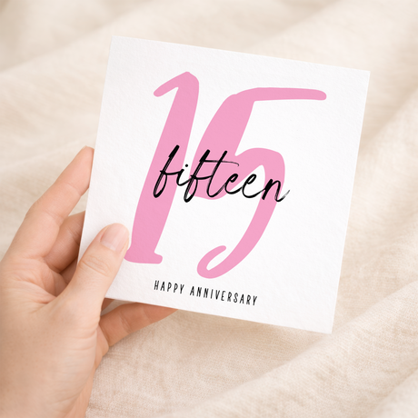 An elegant 15th wedding anniversary greeting card for a husband or wife featuring a clean typographic design on a white background.