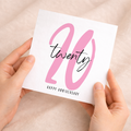 A simple and elegant 20th Wedding Anniversary greeting card featuring a number-based design on a white recycled background.