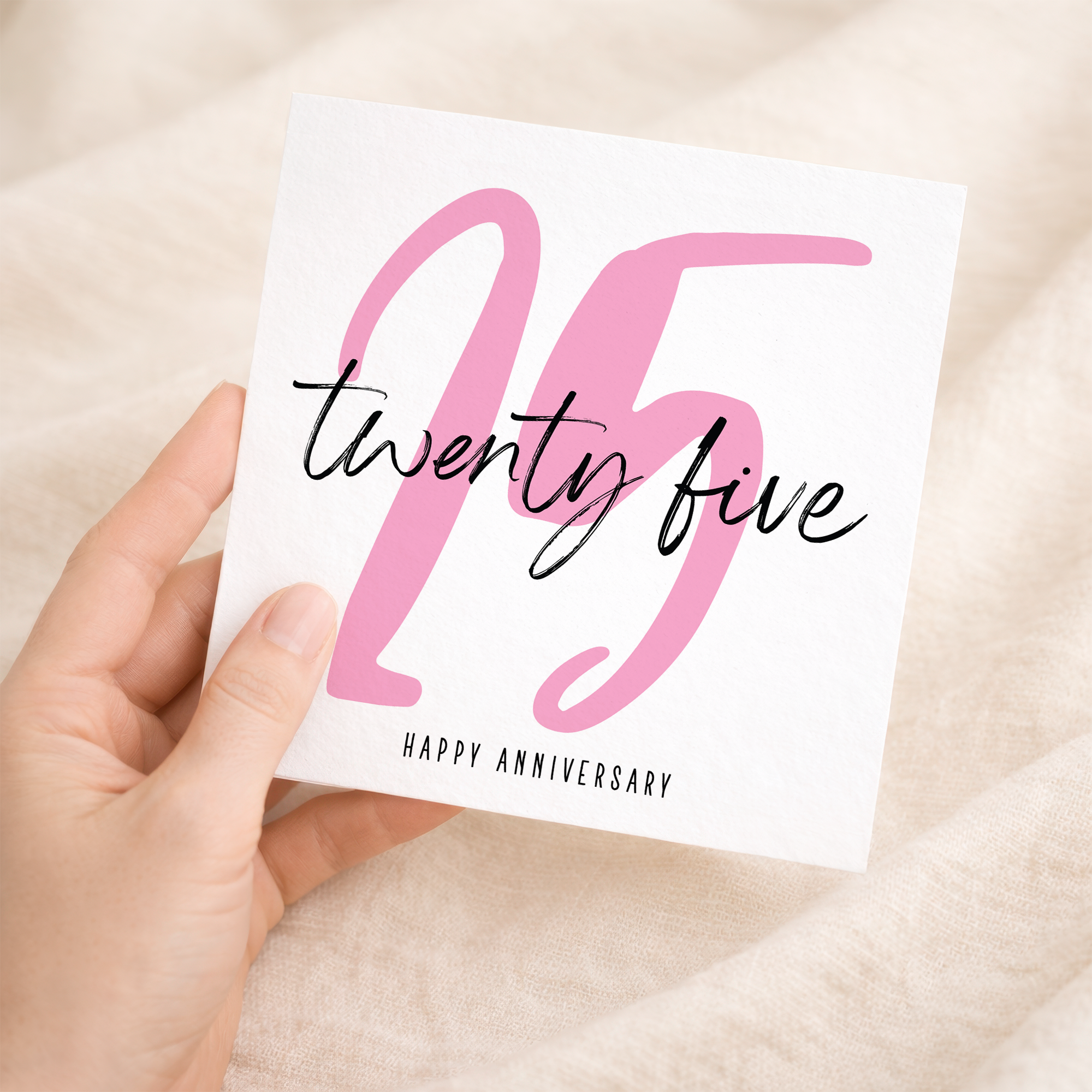 A simple and elegant 25th Wedding Anniversary greeting card featuring a silver-themed milestone design on a white background.