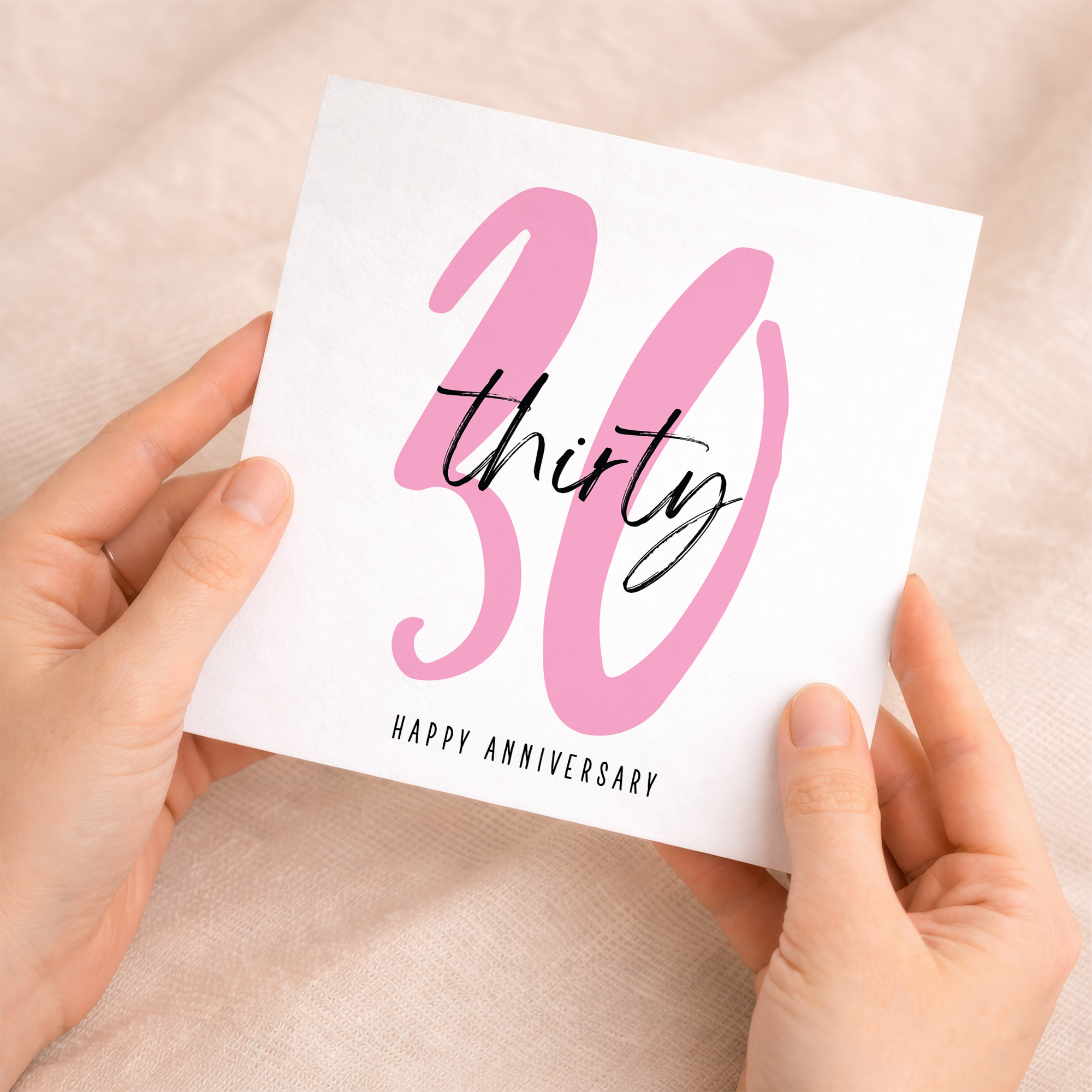 A simple and elegant 30th wedding anniversary greeting card featuring the number 30 in a decorative font on a clean white background.