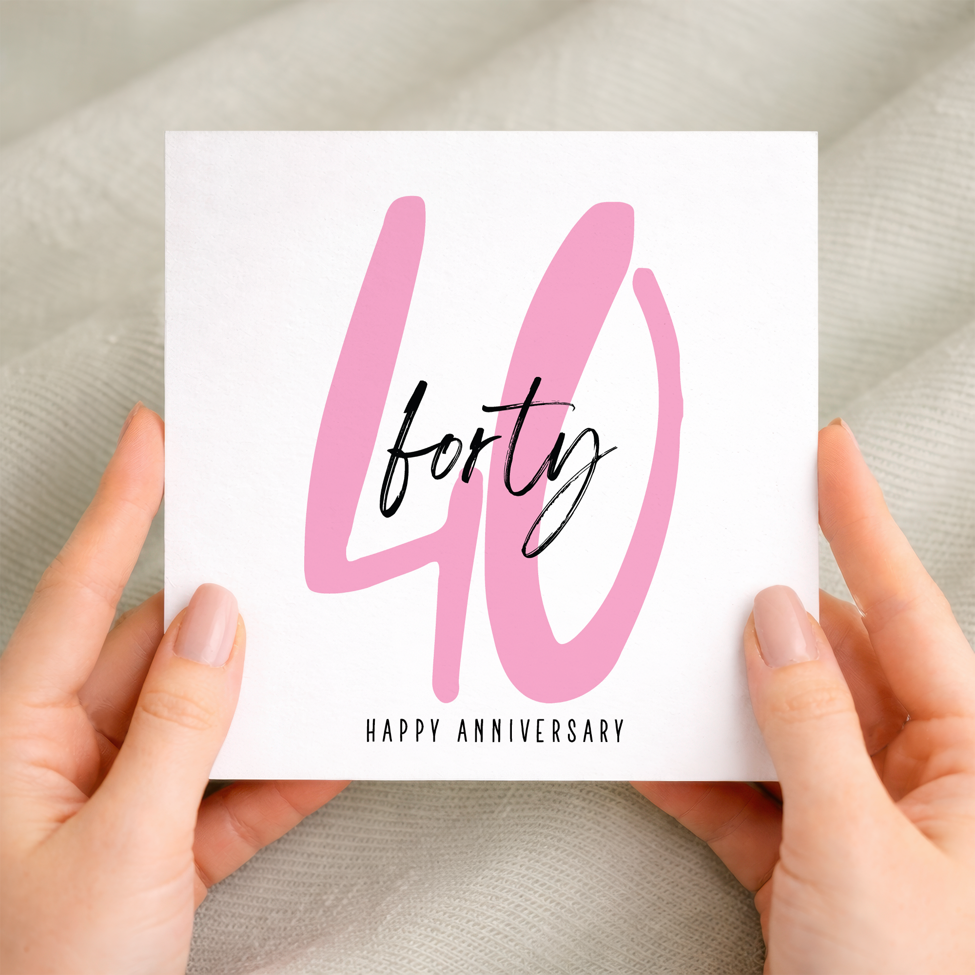 A romantic 40th wedding anniversary greeting card for a husband or wife featuring a simple letters and numbers design on a white background.