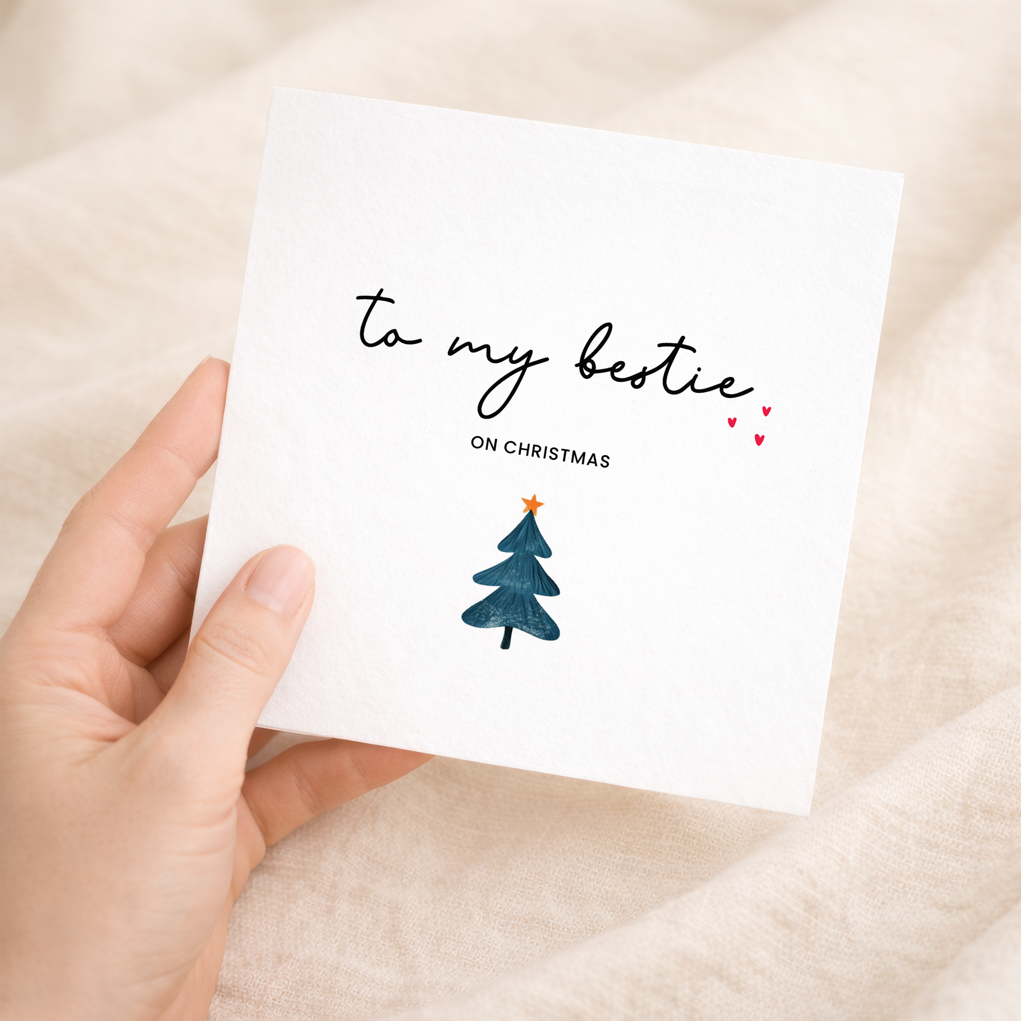 A simple and unique Christmas greeting card for a best friend featuring a festive typographic design on a white background.