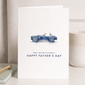Minimalist Father's Day greeting card featuring a blue and white classic car illustration and the message You're a classic dad.