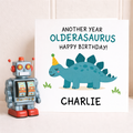 Personalised oldersaurus dinosaur birthday card for children, 6x6 square card