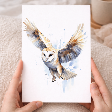 A white greeting card featuring a beautiful barn owl illustration.