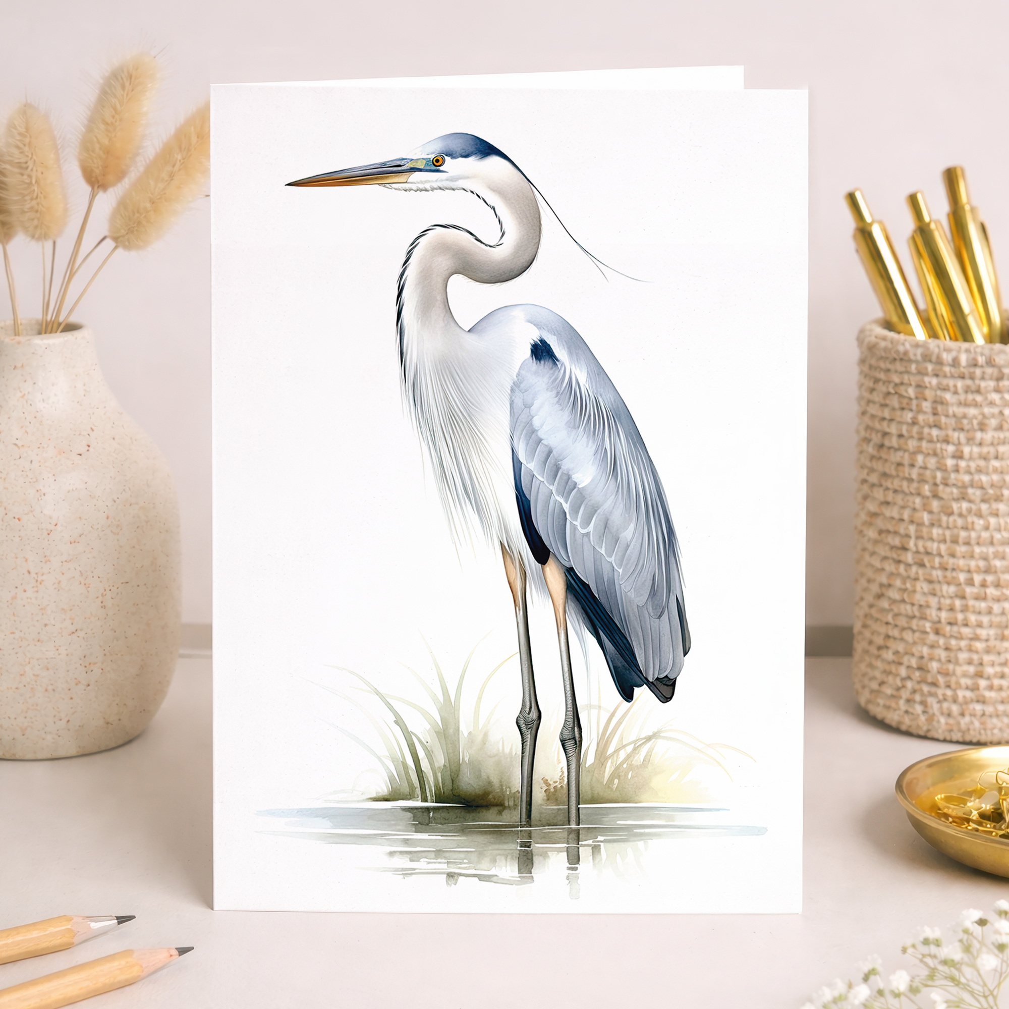 A serene illustration of a grey heron standing gracefully amidst reeds and water, suitable for a nature-themed greeting card.
