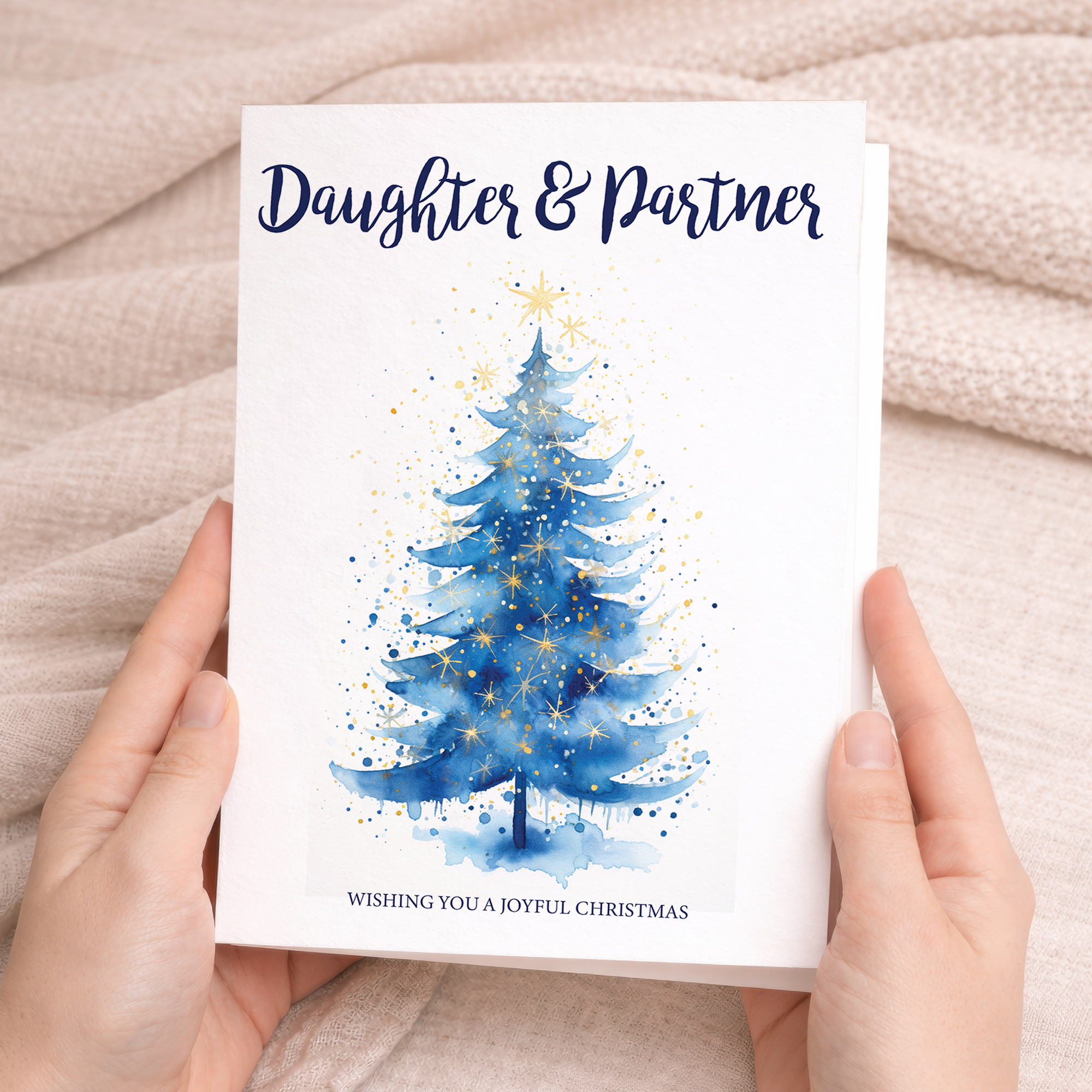 Vertical 5x7 greeting card featuring a minimalist illustration of a decorated Christmas tree. The card is displayed on a brown kraft envelope.