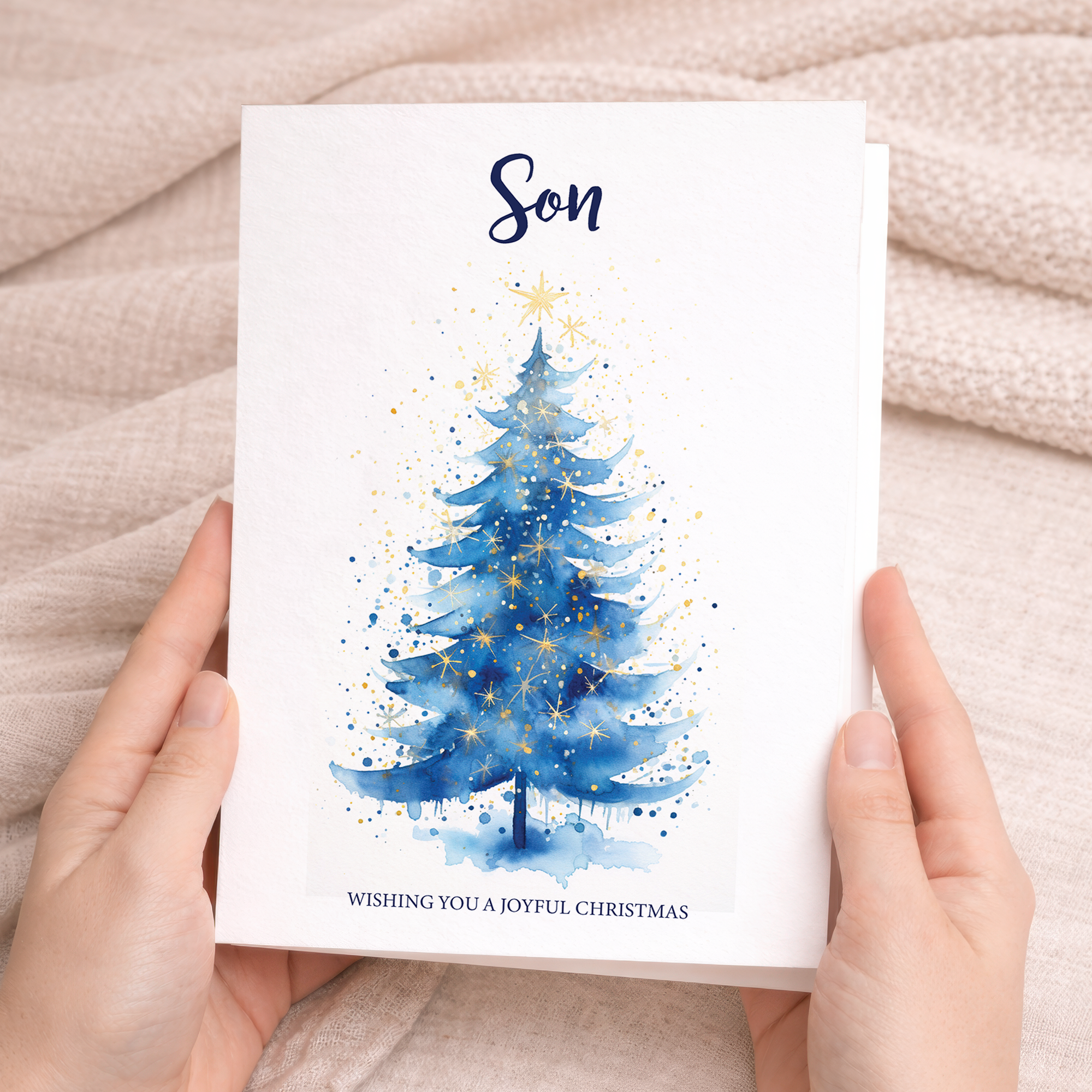 Minimalist Christmas greeting card for a son featuring a festive green Christmas tree design on a white background.