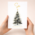 A festive Christmas card for a son featuring an illustrated Christmas tree with colorful decorations and a star on top.