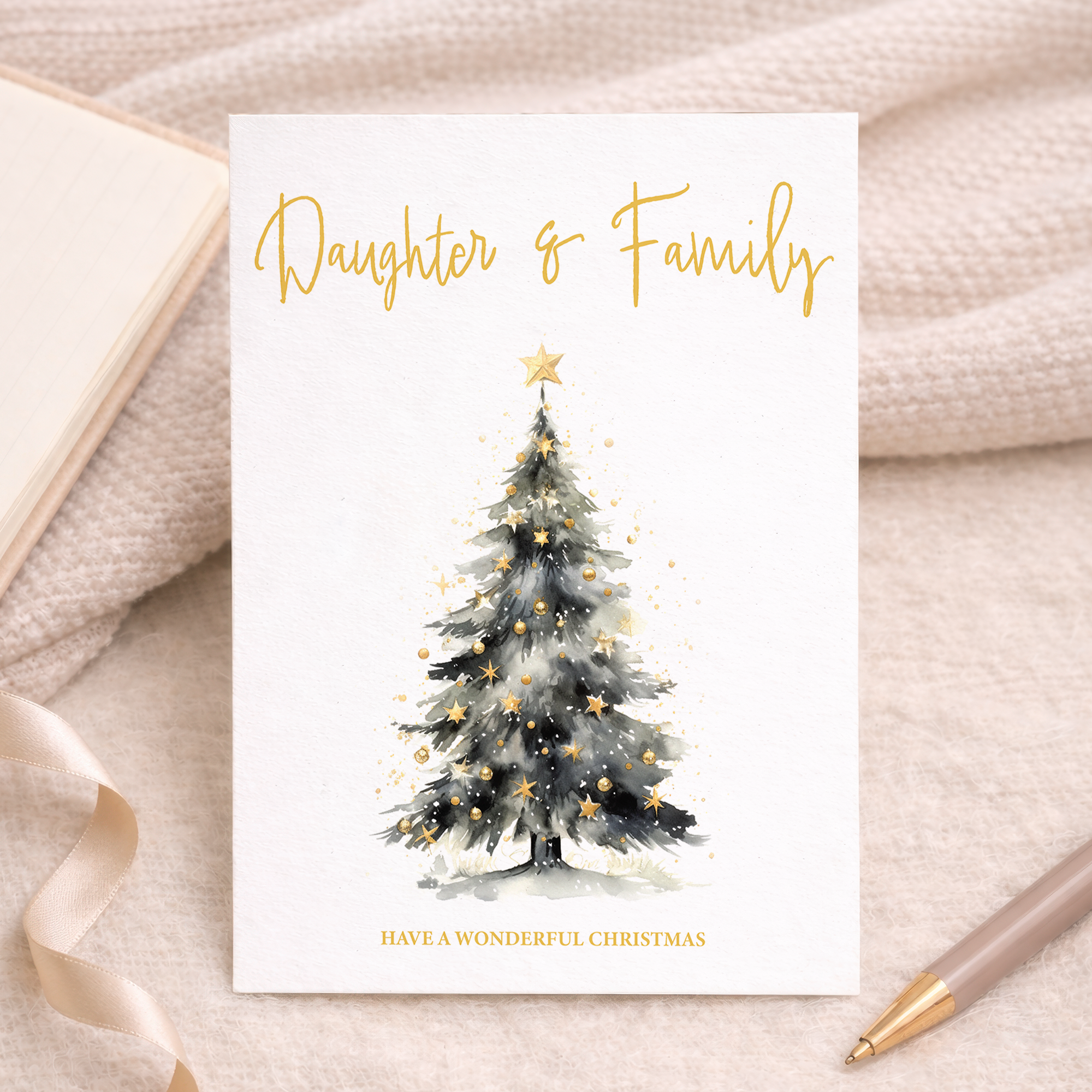 Minimalist Christmas card featuring a stylized, watercolor-style green Christmas tree with a golden star on top, set against a plain white background.
