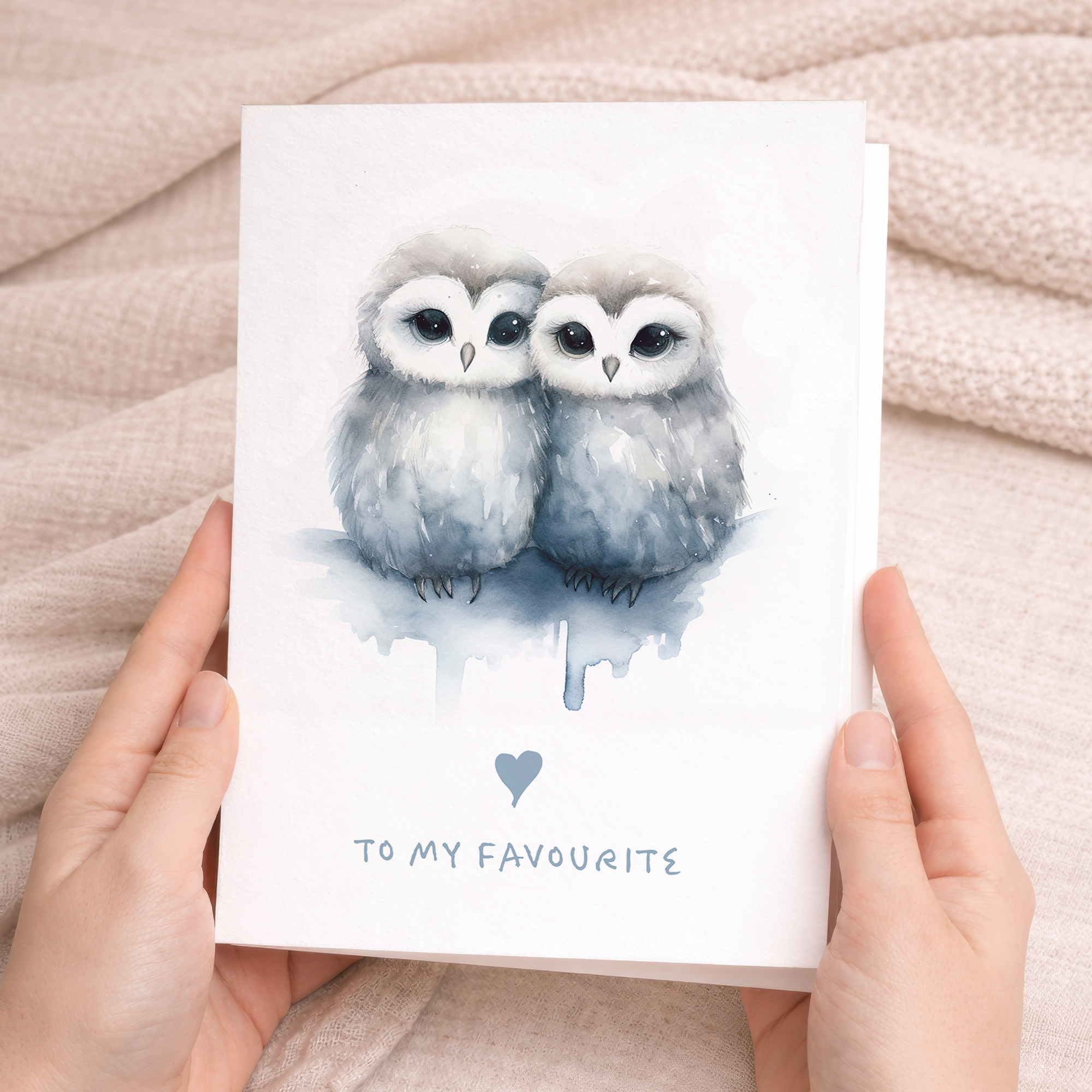 A simple, romantic greeting card featuring two illustrated owls sitting together on a branch, perfect for an anniversary or Valentine's Day.