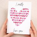 Valentine's Day greeting card featuring a romantic love hearts design for a wife, husband, boyfriend, or girlfriend.