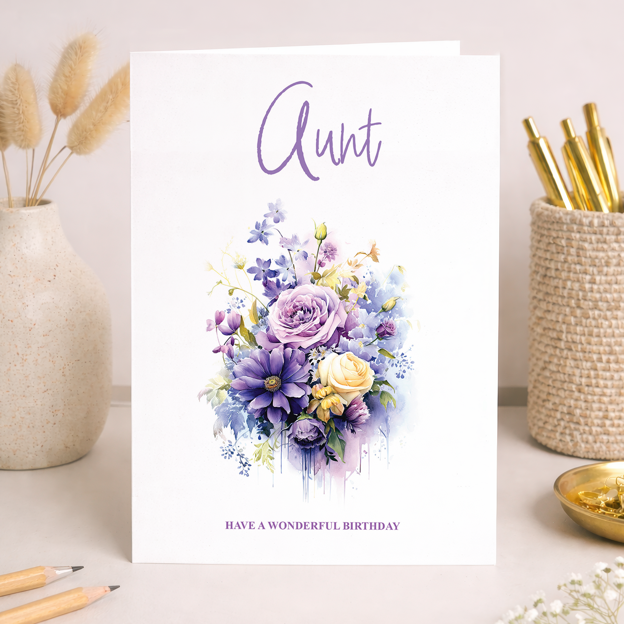 Aunt birthday card featuring a luxury floral design with purple flowers on a white background.