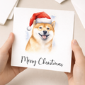 Fun Christmas Card of a Shiba Inu Dog Wearing A Santa Hat Whimsical Watercolour Christmas Card For Animal Lover For Him or Her