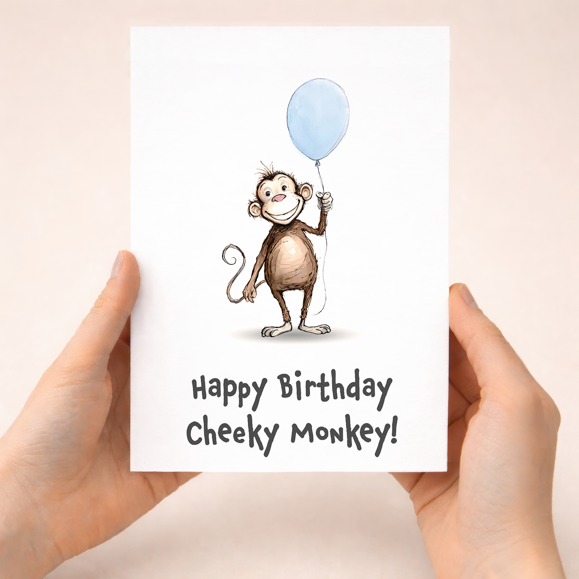 Cute monkey birthday card for children featuring an illustration of a cheeky brown monkey and a colorful party hat.