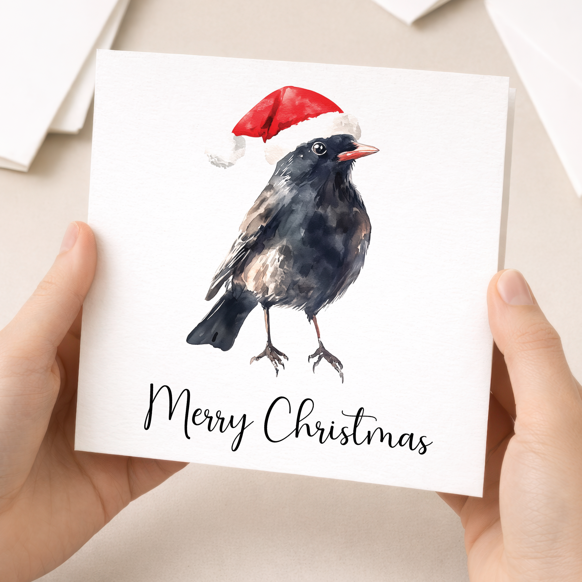 Fun Christmas Card of a Black Bird Wearing A Santa Hat Whimsical Watercolour Christmas Card For Bird Lover For Him or Her