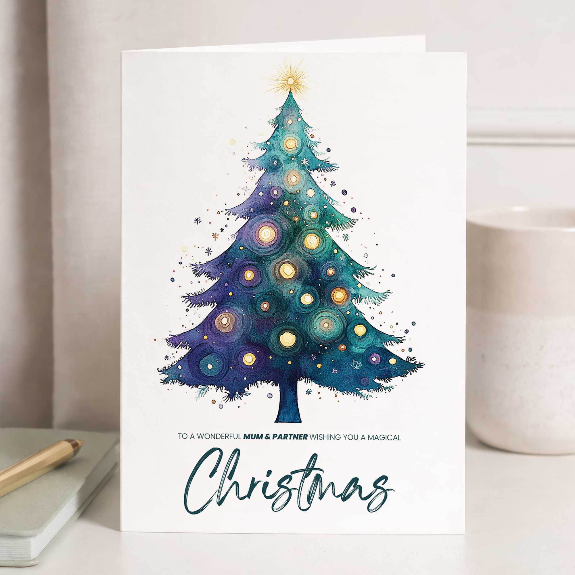 Watercolour illustration of a decorated Christmas tree for a Mum and Partner Christmas card.
