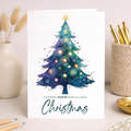 A watercolour Christmas tree design on a Christmas greeting card for a daughter.