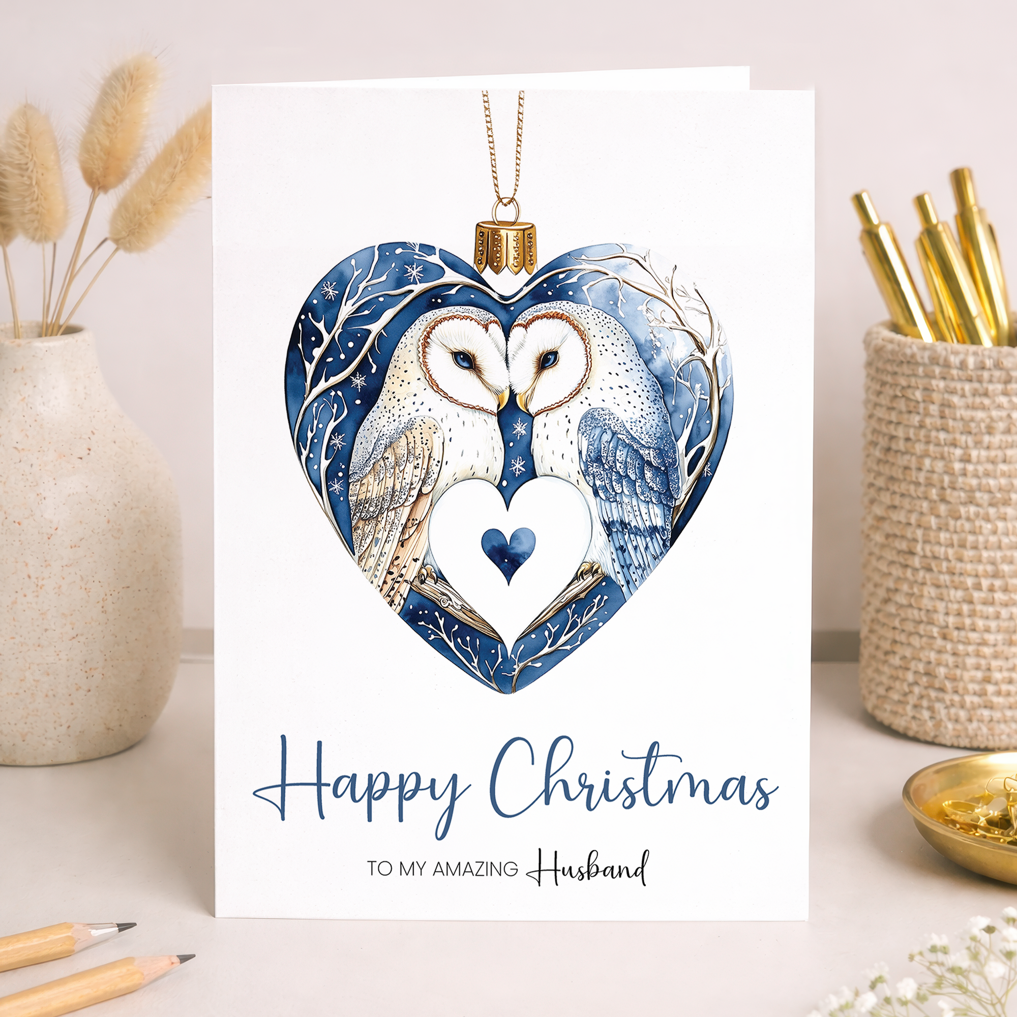 Christmas card for husband featuring a pretty owl bauble design on a white background.
