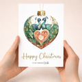 Elegant Christmas card for a wife featuring a unique peacock-themed decorative bauble illustration.