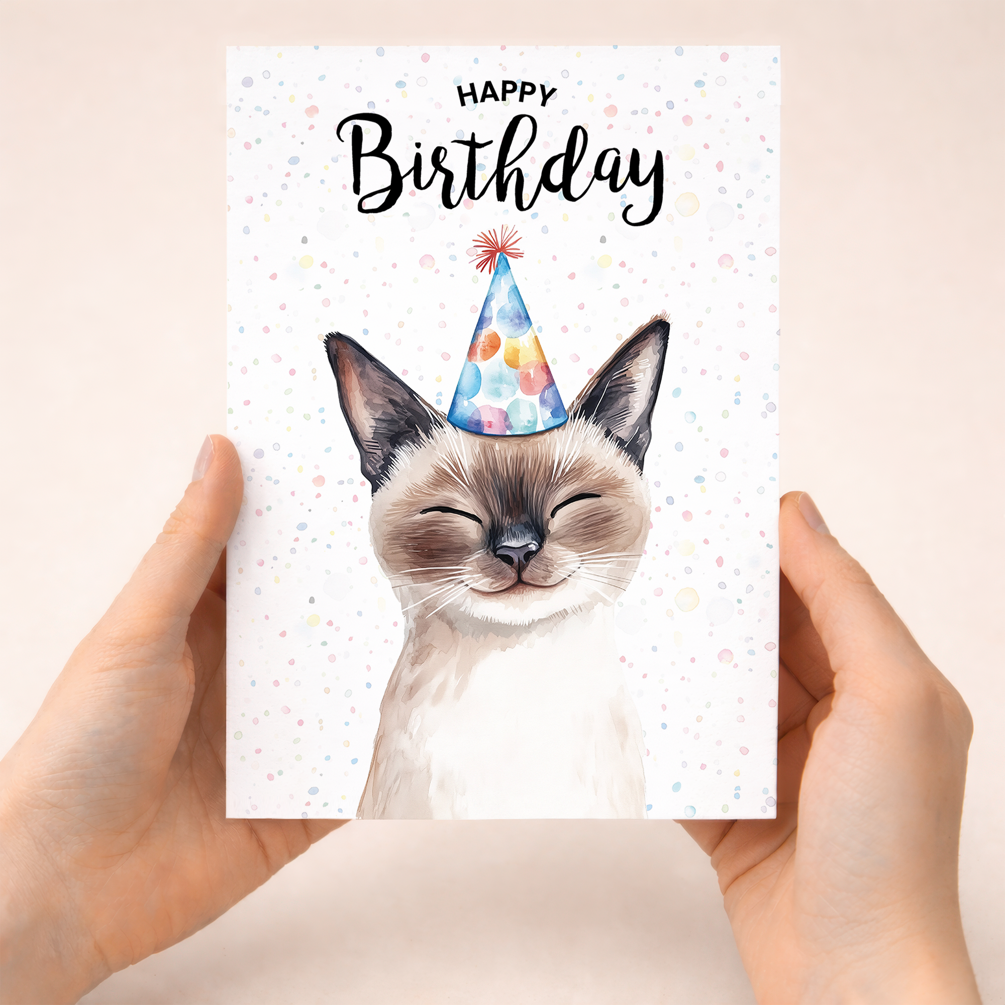 Watercolour illustration of a Siamese cat on a white birthday card with a modern, minimalist design.