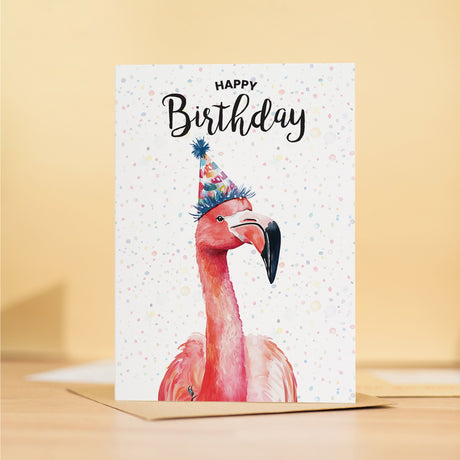 Birthday card featuring a vibrant flamingo illustration, perfect for gifting to him or her on their special day.
